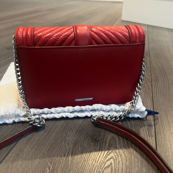 Selling a brand new Rebeca Minkoff crossbody bag in red. - Picture 5 of 7